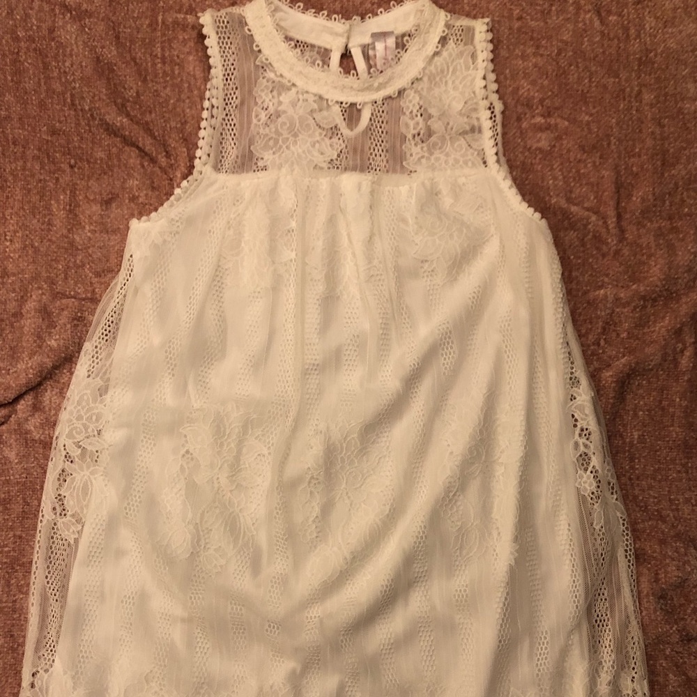 Mid length lace dress. Button in back